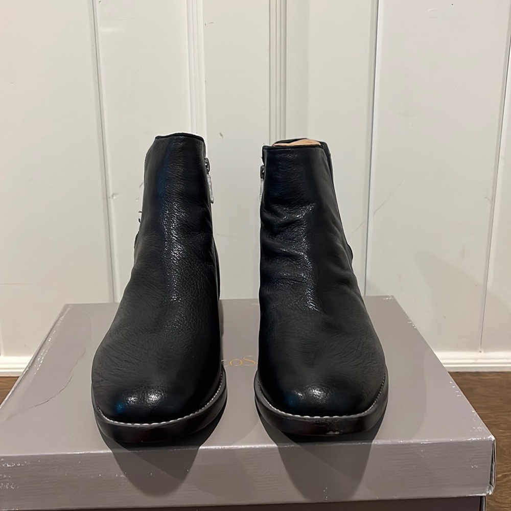Dressy, leather, low-block heel black booties.